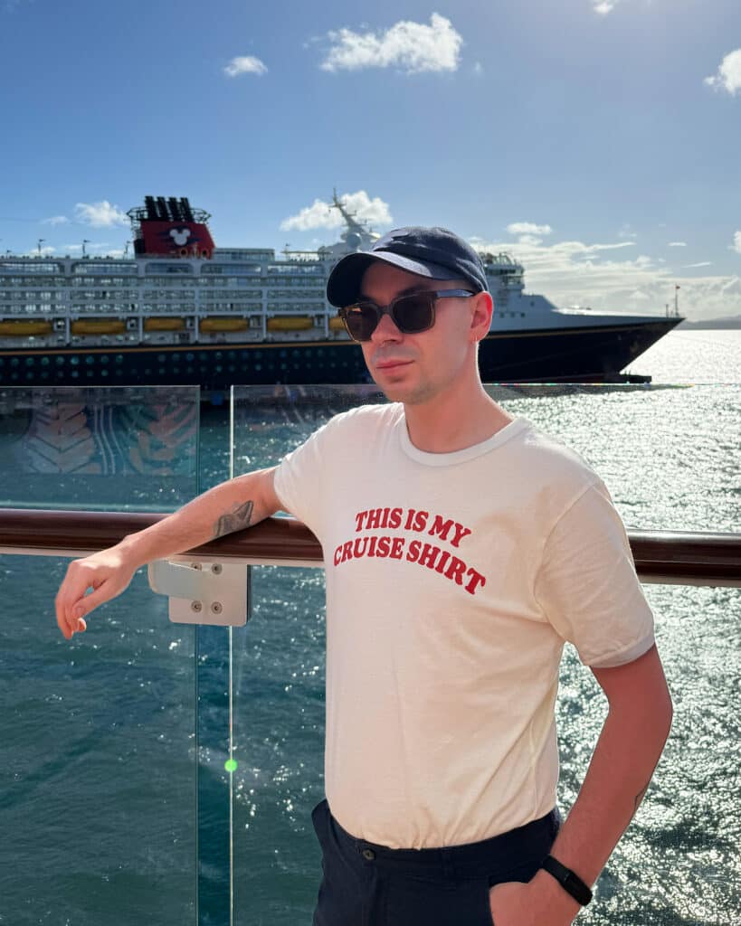 Photo of Owen wearing a t-shirt that says "This is My Cruise Shirt"